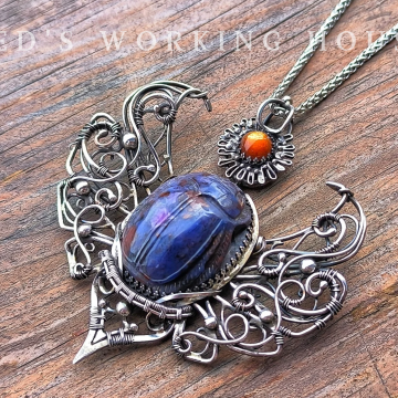 舒俱徠聖甲蟲逐日墜